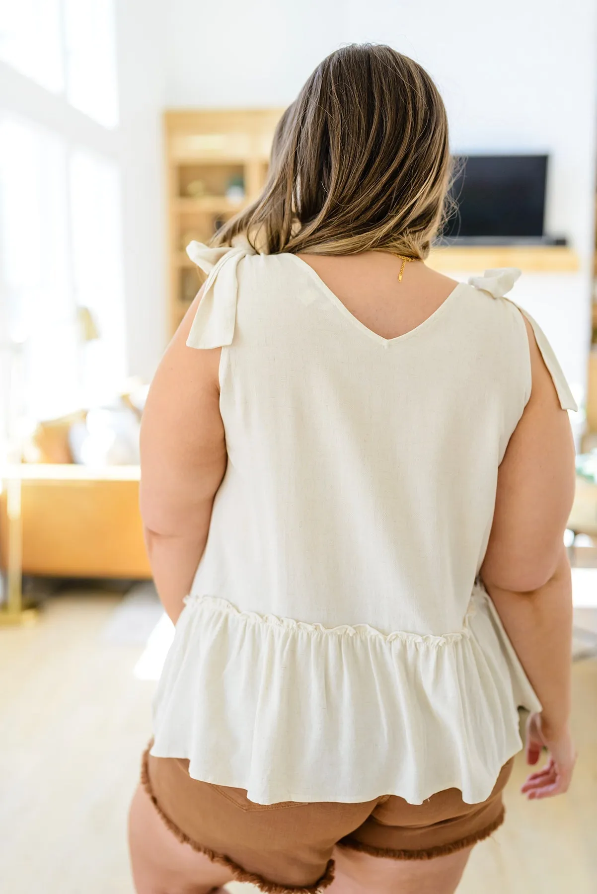 All Tied Up Peplum Tank